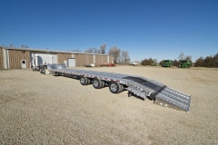 Flatbed trailer with ramp extended