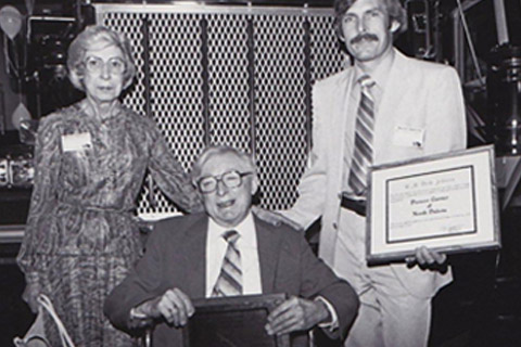 Johnsen Family 'Dad,' Richard Johnsen Jr (right) wins an award, accompanied by his parents, Niva and Richard Johnsen Sr.