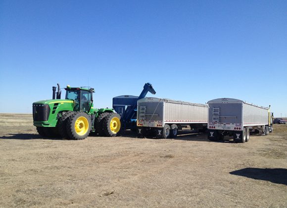 green tractor and other Grain Trailer Sales, Used Trailers, and Hopper Trailers for Sale in Minot, ND